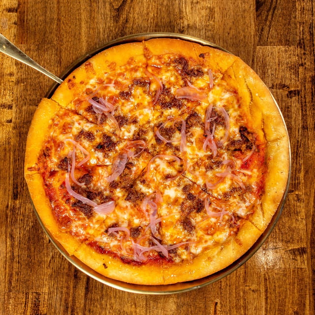 Chorizo & Sunny Eggs Pizza.